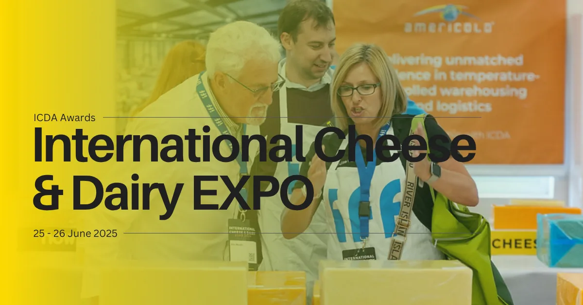 International Cheese & Dairy EXPO banner over visitors examining cheese at a stand
