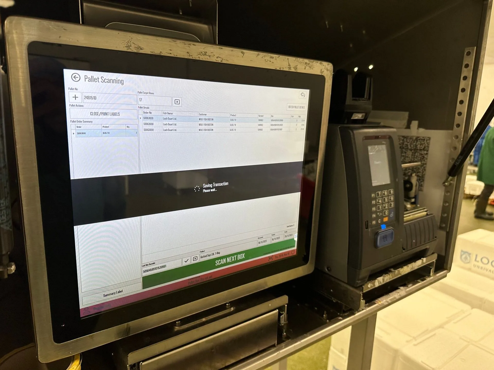 Touchscreen pallet-scanning terminal and label printer on a packing line